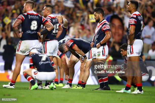 The Roosters look dejected during the NRL Preliminary Final match between the Sydney Roosters and the North Queensland Cowboys at Allianz Stadium on...