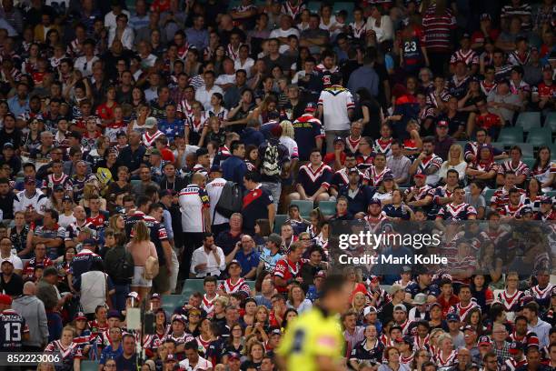 Roosters supporters leave before fulltime during the NRL Preliminary Final match between the Sydney Roosters and the North Queensland Cowboys at...