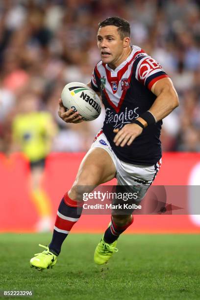 Michael Gordon of the Roosters runs the ball during the NRL Preliminary Final match between the Sydney Roosters and the North Queensland Cowboys at...