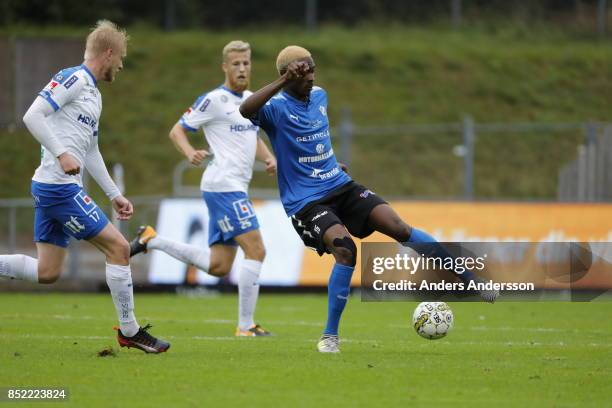 Aboubakar Keita of Halmstad BK and Kalle Holmberg of IFK Norrkoping compete for the ball at Orjans Vall on September 23, 2017 in Halmstad, Sweden.