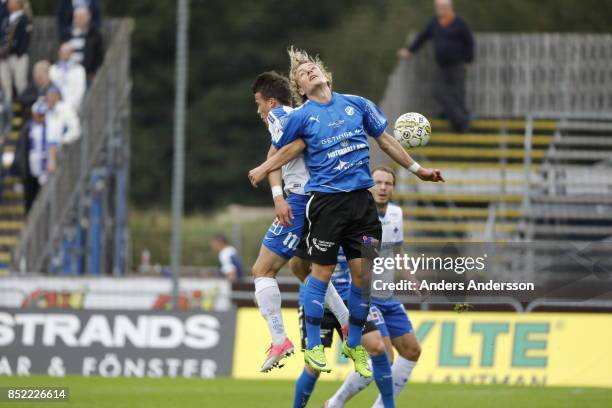 Simon Skrabb of IFK Norrkoping and Höskuldur Gunnlaugsson of Halmstad BK compete for a header at Orjans Vall on September 23, 2017 in Halmstad,...