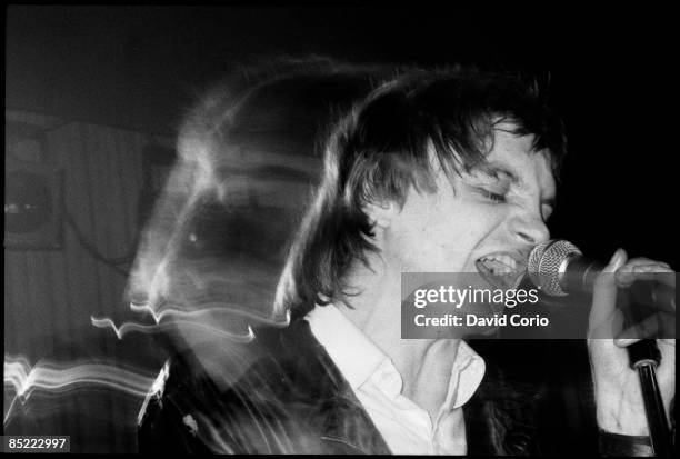 Mark E Smith of The Fall performing at The Lyceum Theatre, London, UK on 12 December 1982.