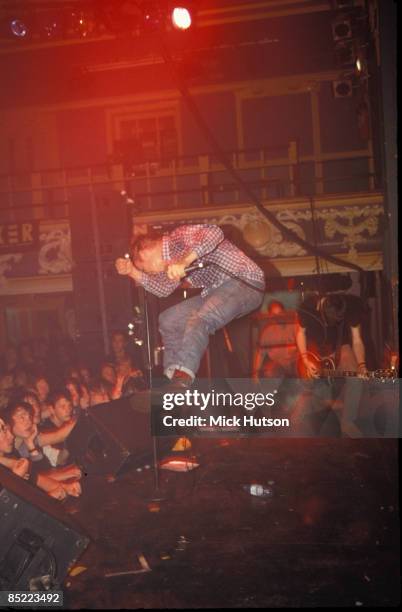 Photo of BLUR and Damon ALBARN and Graham COXON, Damon Albarn & Graham Coxon performing live onstage wearing Doc Marten boots