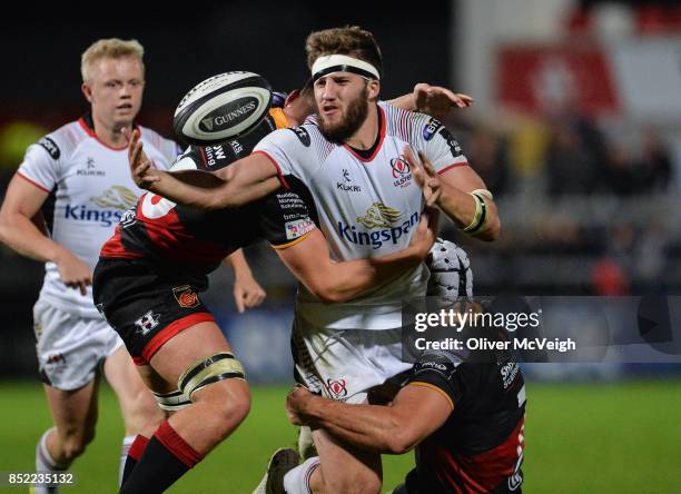 Antrim , United Kingdom - 22 September 2017; Stuart McCloskey of Ulster is tackled by Dorian Jones and Ollie Griffiths of Dragons during the Guinness...