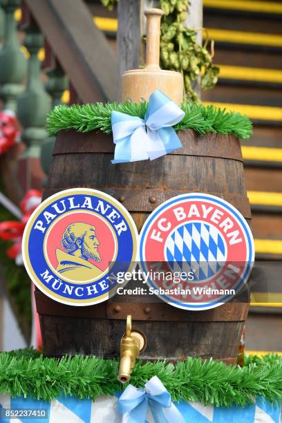 Beer barrel with the logo of FC Bayern Muenchen and Paulaner beer brewery photographed at the Oktoberfest beer festival at Kaefer Wiesnschaenke tent...
