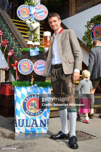 Thomas Mueller of FC Bayern Muenchen attends the Oktoberfest beer festival at Kaefer Wiesnschaenke tent at Theresienwiese on September 23, 2017 in...