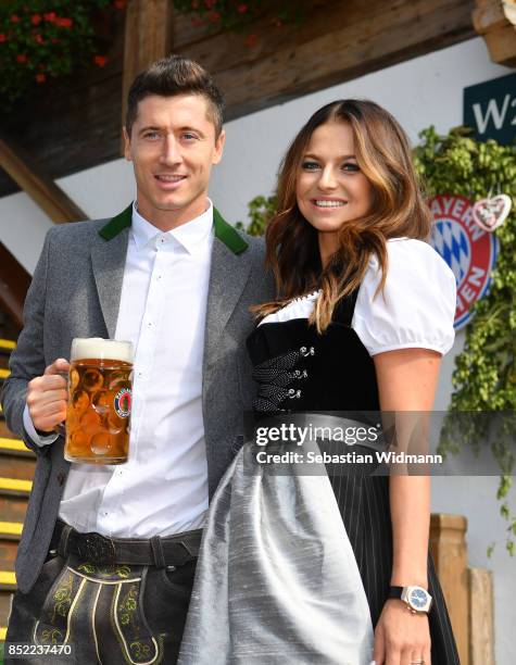 Robert Lewandowski of FC Bayern Muenchen and his wife Anna Stachurska attend the Oktoberfest beer festival at Kaefer Wiesnschaenke tent at...