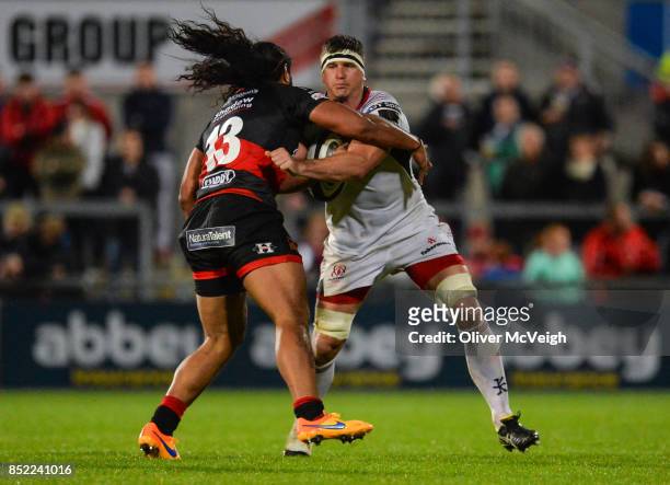 Antrim , United Kingdom - 22 September 2017; Robbie Diack of Ulster is tackled by Thretton Palamo of Dragons during the Guinness PRO14 Round 4 match...