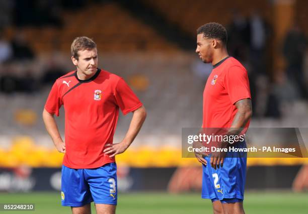 Coventry City's Blair Adams and Cyrus Christie