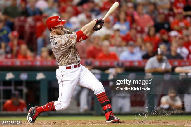 Patrick Kivlehan of the Cincinnati Reds takes an at bat during the game against the St. Louis Cardinals at Great American Ball Park on September 19,...