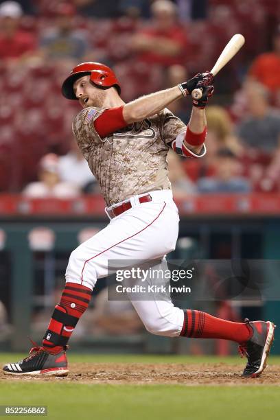 Patrick Kivlehan of the Cincinnati Reds takes an at bat during the game against the St. Louis Cardinals at Great American Ball Park on September 19,...