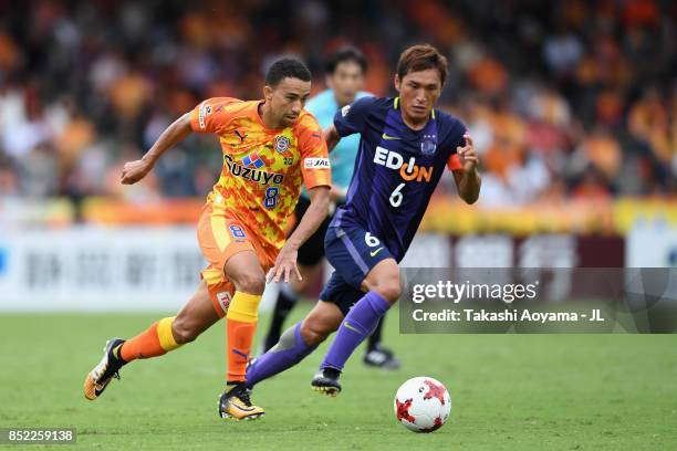 Tiago Alves of Shimizu S-Pulse and Toshihiro Aoyama of Sanfrecce Hiroshima compete for the ball during the J.League J1 match between Shimizu S-Pulse...