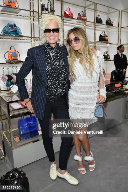 Ellen von Unwerth and Erica Pelosini attend Claudia Schiffer book launch cocktail at Versace Boutique during Milan Fashion Week Spring/Summer 2018 on...