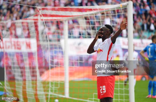 Jean-Kevin Augustin of Leipzig celebrates after he scored his team first goal to make it 1:0 during the Bundesliga match between RB Leipzig and...