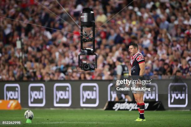 Michael Gordon of the Roosters attempts a conversion as spider cam films during the NRL Preliminary Final match between the Sydney Roosters and the...