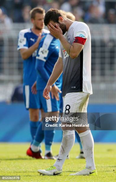 Michele-Claudio Rizzi of Muenster looks dejected after the 3.Liga match between FC Carl Zeiss Jena and SC Preussen Muenster at Ernst-Abbe Sportfeld...