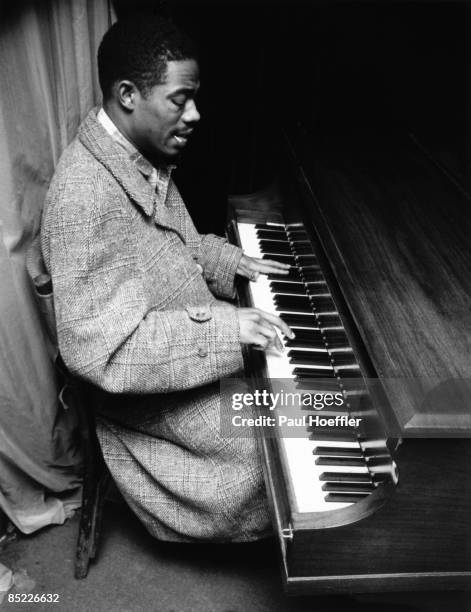 Photo of Eric DOLPHY, Eric Dolphy performing, playing piano