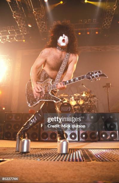 Photo of Paul STANLEY and KISS, Paul Stanley performing live onstage, playing Washburn guitar