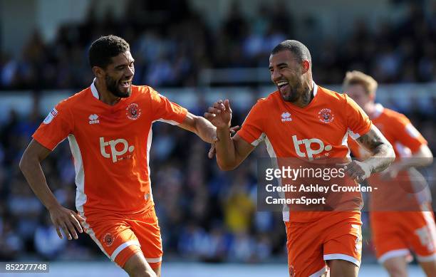 Blackpool's Kyle Vassell celebrates scoring the opening goal during the Sky Bet League One match between Bristol Rovers and Blackpool at Memorial...