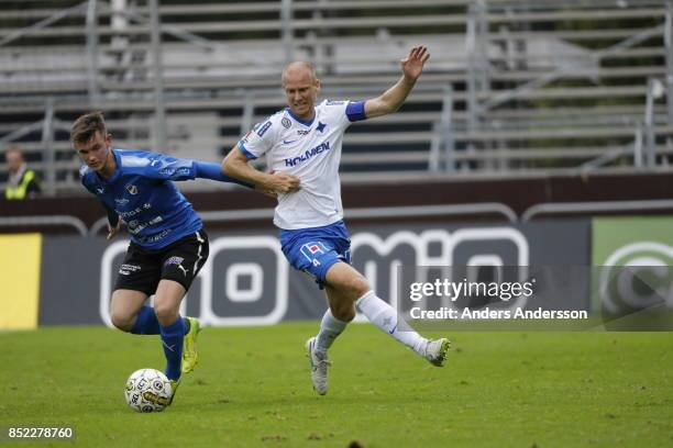 Jonathan Svedberg of Halmstad BK and Andreas Johansson of IFK Norrkoping competes for the ball at Orjans Vall on September 23, 2017 in Halmstad,...