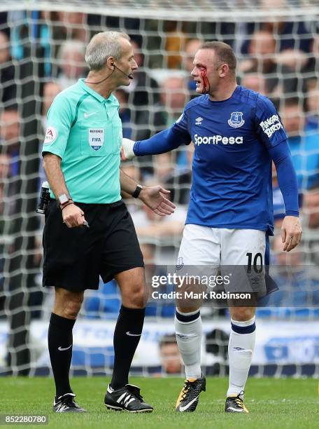 Wayne Rooney of Everton appeals to referee Martin Atkinson during the Premier League match between Everton and AFC Bournemouth at Goodison Park on...