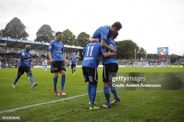 Alexander Berntsson of Halmstad BK celebrates with team mates after scoring 1-0 at Orjans Vall on September 23, 2017 in Halmstad, Sweden.