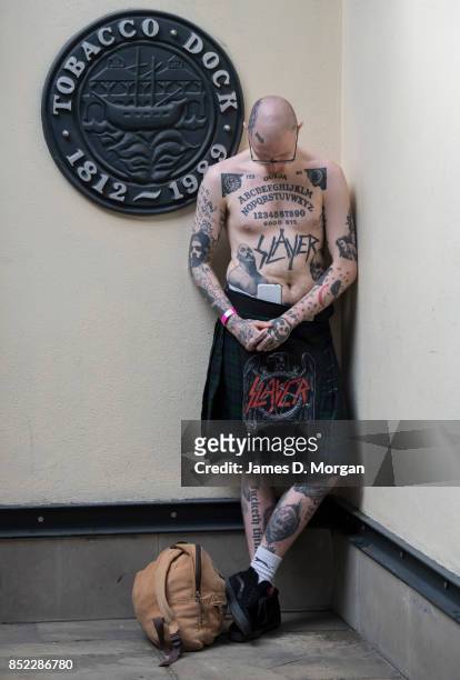 Man in a kilt at the London Tattoo convention at Tobacco Dock on September 23, 2017 in London, England. Over 400 tattoo artists are attending the...