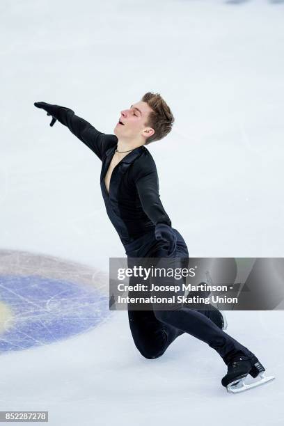 Andrew Torgashev of the United States competes in the Junior Men's Free Skating during day three of the ISU Junior Grand Prix of Figure Skating at...