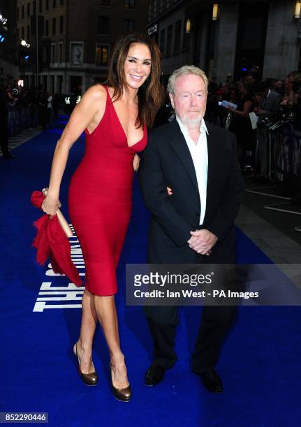 Ridley Scott and Giannina Facio arriving at a special screening of new film The Counselor at the Odeon West End, London.