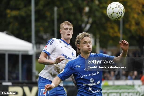 Höskuldur Gunnlaugsson of Halmstad BK and Eric Smith of IFK Norrkoping competes for the ball at Orjans Vall on September 23, 2017 in Halmstad, Sweden.