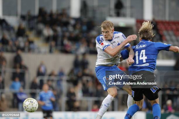 Eric Smith of IFK Norrkoping and Höskuldur Gunnlaugssonof Halmstad BK competes for the ball at Orjans Vall on September 23, 2017 in Halmstad, Sweden.