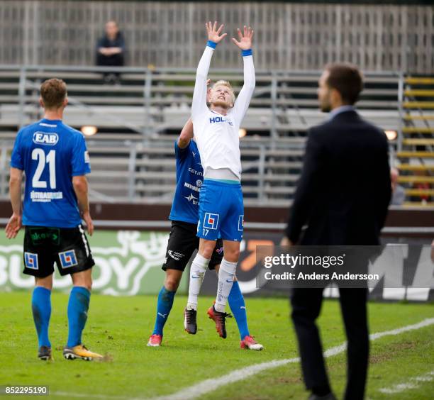 Kalle Holmberg of IFK Norrkoping jumps for a ball in competition with Alexander Berntsson of Halmstad BK at Orjans Vall on September 23, 2017 in...