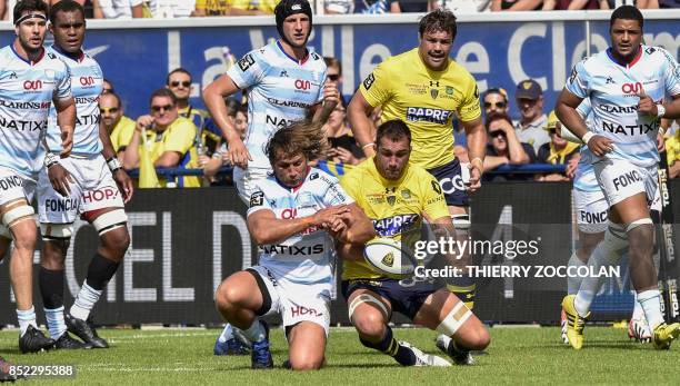 Racing 92's French hooker Dimitri Szarzewski and Clermont's French flanker Alexandre Lapandry go for the ball during the French Top 14 Rugby Union...