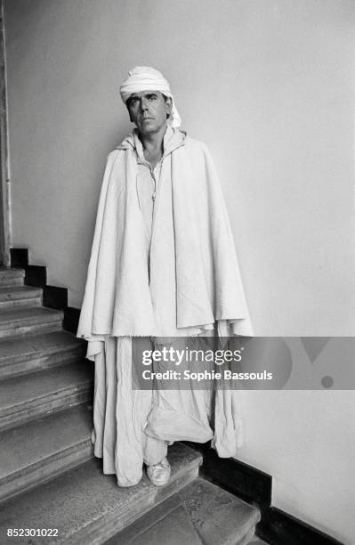 French writer and lampoonist Jean-Edern Hallier dresses as Father De Foucault, one of the characters from his novel De l'autre cote du vent,...