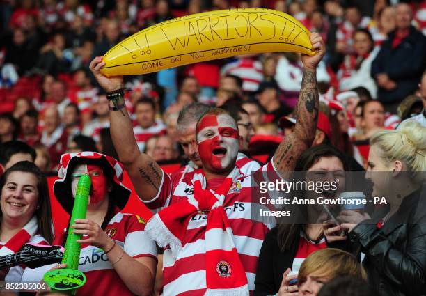 Wigan Warriors fans in the stands during the Super League Grand Final at Old Trafford, Manchester.