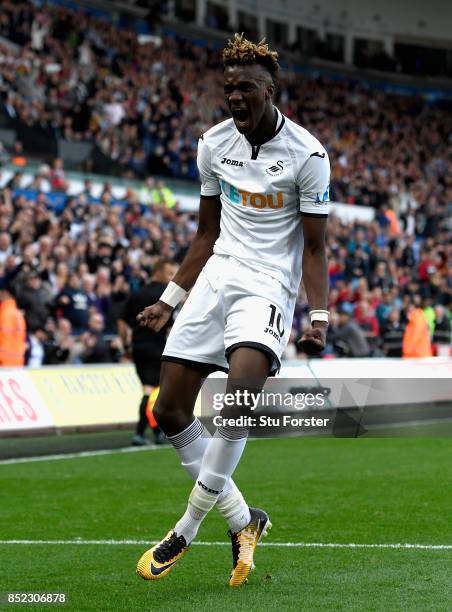 Tammy Abraham of Swansea City celebrates scoring his side's first goal during the Premier League match between Swansea City and Watford at Liberty...