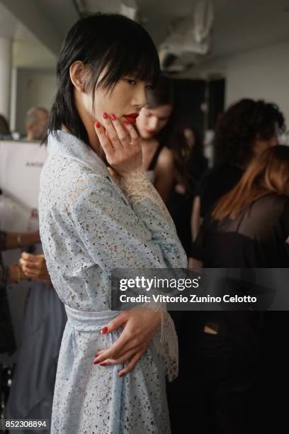 Model is seen backstage ahead of the Blumarine show during Milan Fashion Week Spring/Summer 2018 on September 23, 2017 in Milan, Italy.