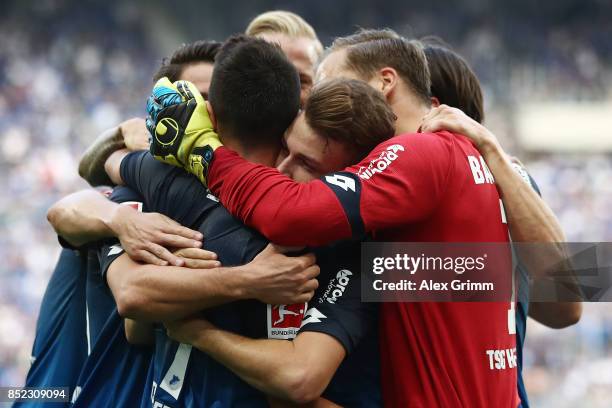 Lukas Rupp of Hoffenheim celebrates with team mates after he scored his teams second goal to make it 2:0 during the Bundesliga match between TSG 1899...