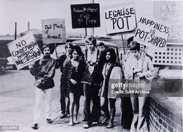 Singer Robert Plant, later of Led Zeppelin , and fellow Band Of Joy members John Elson , Steve Taylor , and Dave Evans pose with a group of drugs...