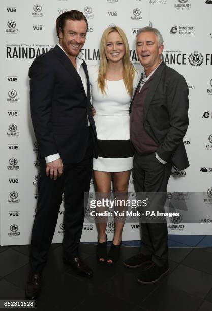 Cast members Toby Stephens, Caity Lotz and Denis Lawson arriving for the UK premiere of The Machine, as part of the 21st Raindance Film Festival, at...