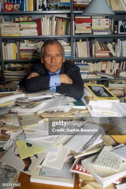 French writer Jean d'Ormesson sits among a pile of books and papers. D'Ormesson, a member of the Academie Francaise since 1973, has just published...