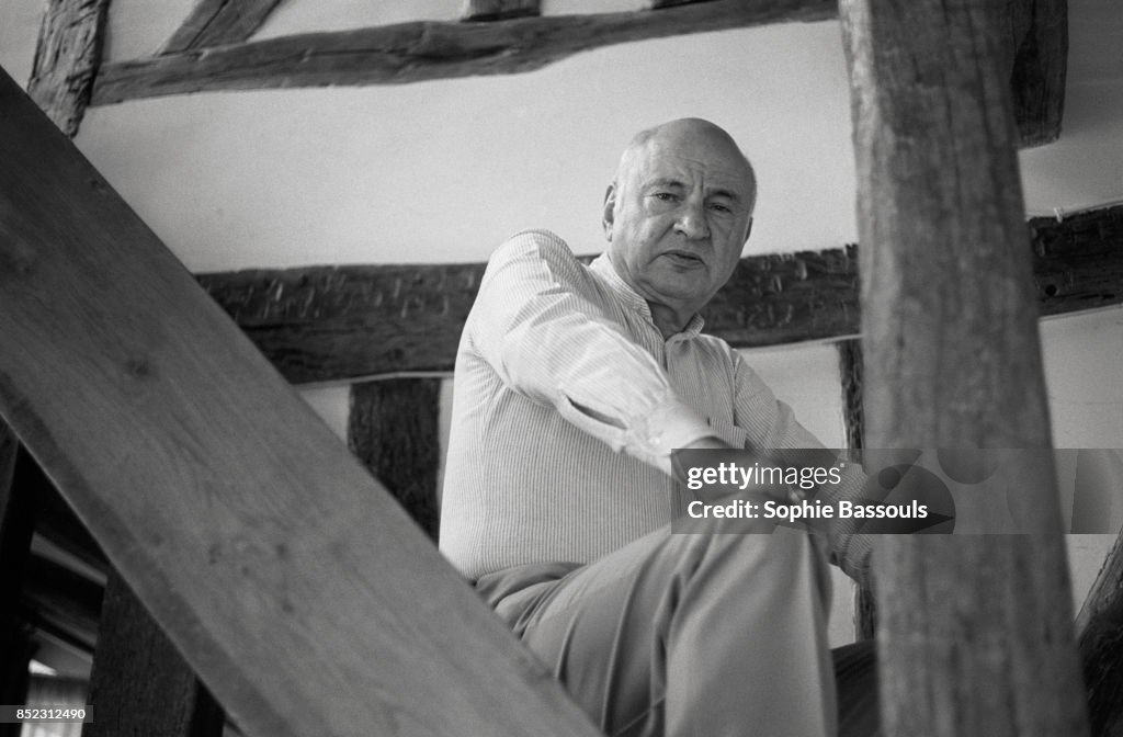Writer Edgar Morin Seated on Stairs