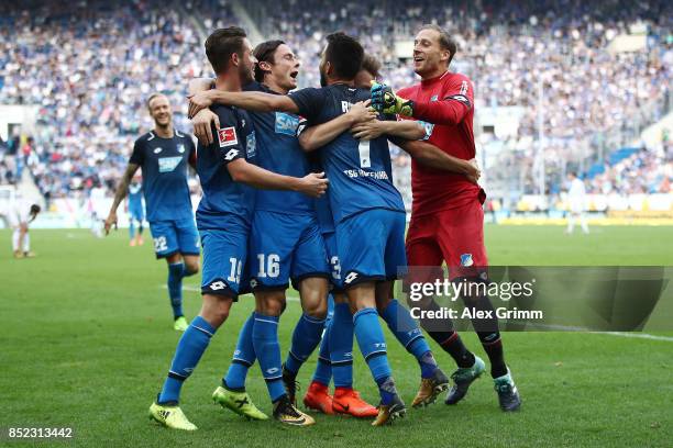 Lukas Rupp of Hoffenheim celebrates with team mates after he scored his teams second goal to make it 2:0 during the Bundesliga match between TSG 1899...