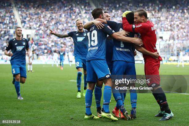 Lukas Rupp of Hoffenheim celebrates with team mates after he scored his teams second goal to make it 2:0 during the Bundesliga match between TSG 1899...