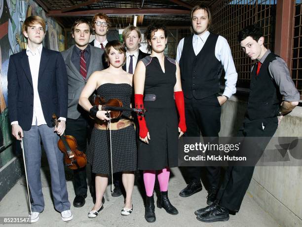 Photo of ARCADE FIRE; L to R: Owen Pallett, Will Butler, Richard Reed Parry , Sarah Neufeld, Tim Kingsbury, Regine Chassagne, Win Butler, Jeremy Gara