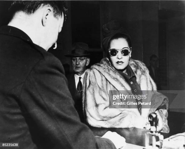 Photo of Billie HOLIDAY; arriving at preliminary court hearing