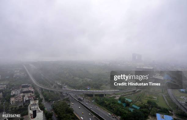 Pleasant weather in Delhi-NCR due to heavy rainfall, on September 23, 2017 in Noida, India. The national capital region witnessed cloudy skies and...