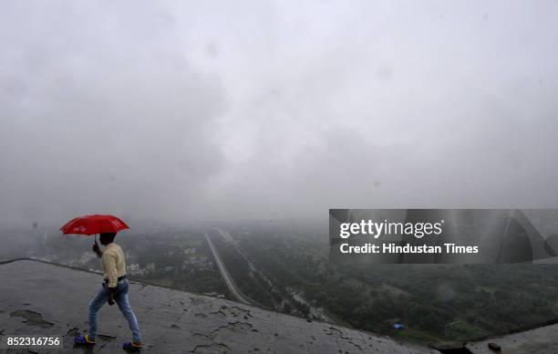 Pleasant weather in Delhi-NCR due to heavy rainfall, on September 23, 2017 in Noida, India. The national capital region witnessed cloudy skies and...