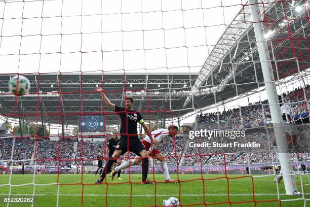 Jean-Kevin Augustin of Leipzig scores his teams first goal to make it 1:0 during the Bundesliga match between RB Leipzig and Eintracht Frankfurt at...