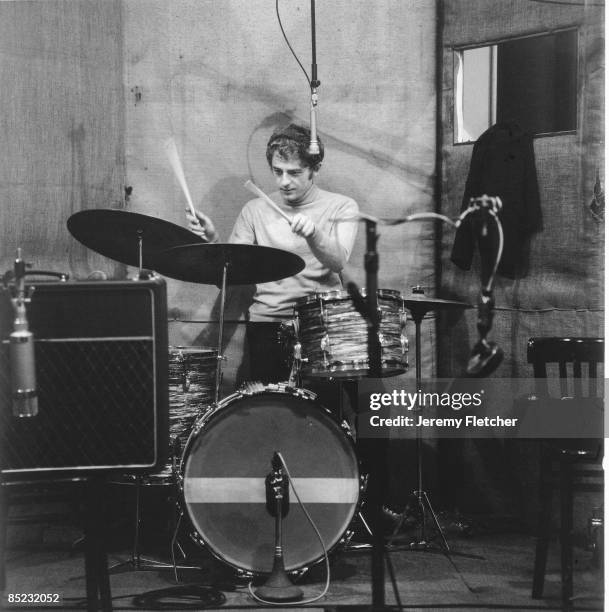 Photo of Mike HUGG and MANFRED MANN, Mike Hugg recording in the studio, playing drums